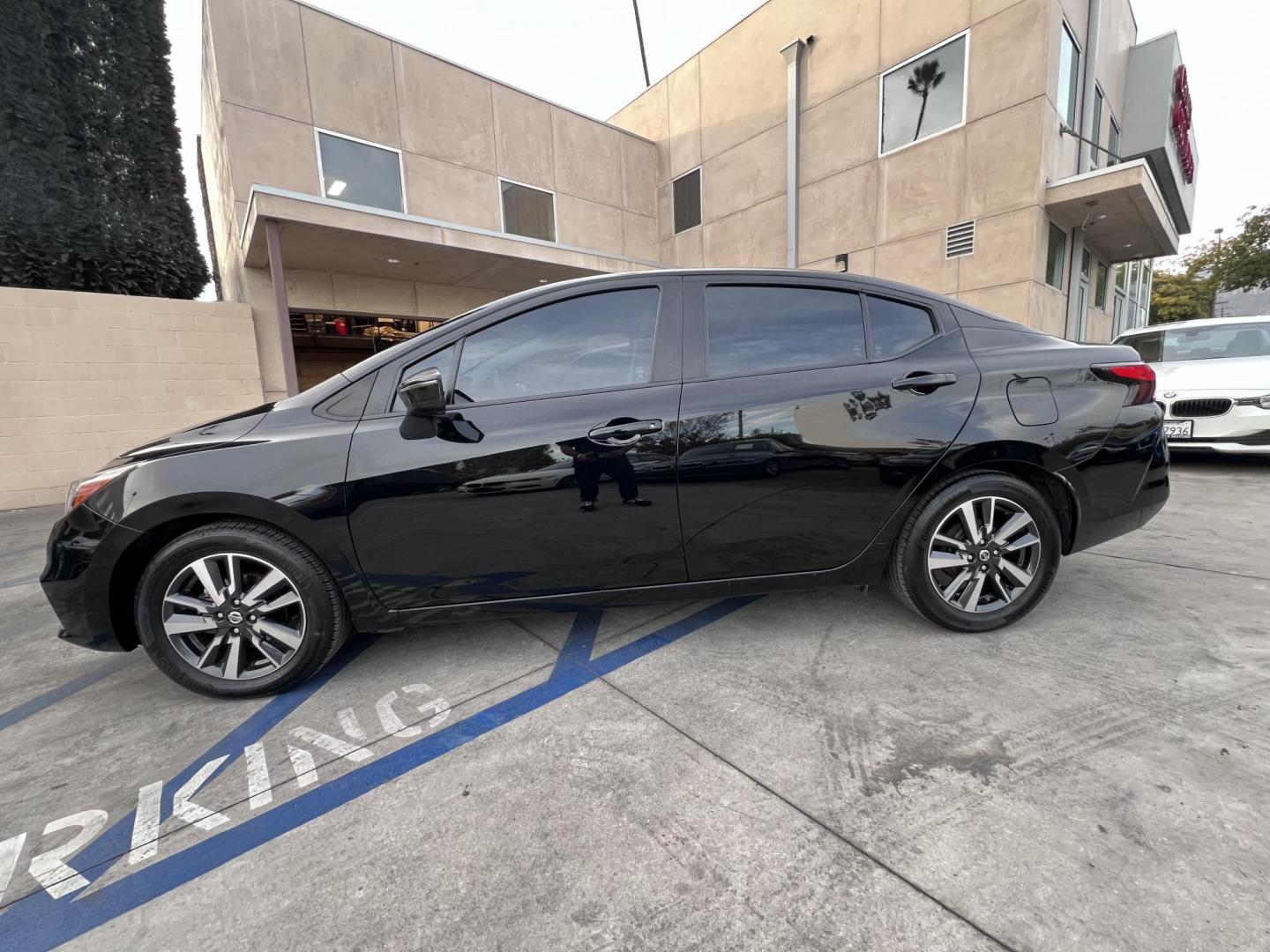 2021 Black /Black Nissan Versa SV (3N1CN8EV0ML) with an 1.6L L4 DOHC 16V engine, CVT transmission, located at 30 S. Berkeley Avenue, Pasadena, CA, 91107, (626) 248-7567, 34.145447, -118.109398 - 021 Nissan Versa SV: The Perfect Blend of Style, Efficiency, and Affordability If you’re searching for a reliable, fuel-efficient, and stylish compact sedan, the 2021 Nissan Versa SV checks all the boxes. This vehicle offers a modern design, advanced technology features, and an impressive perform - Photo#3