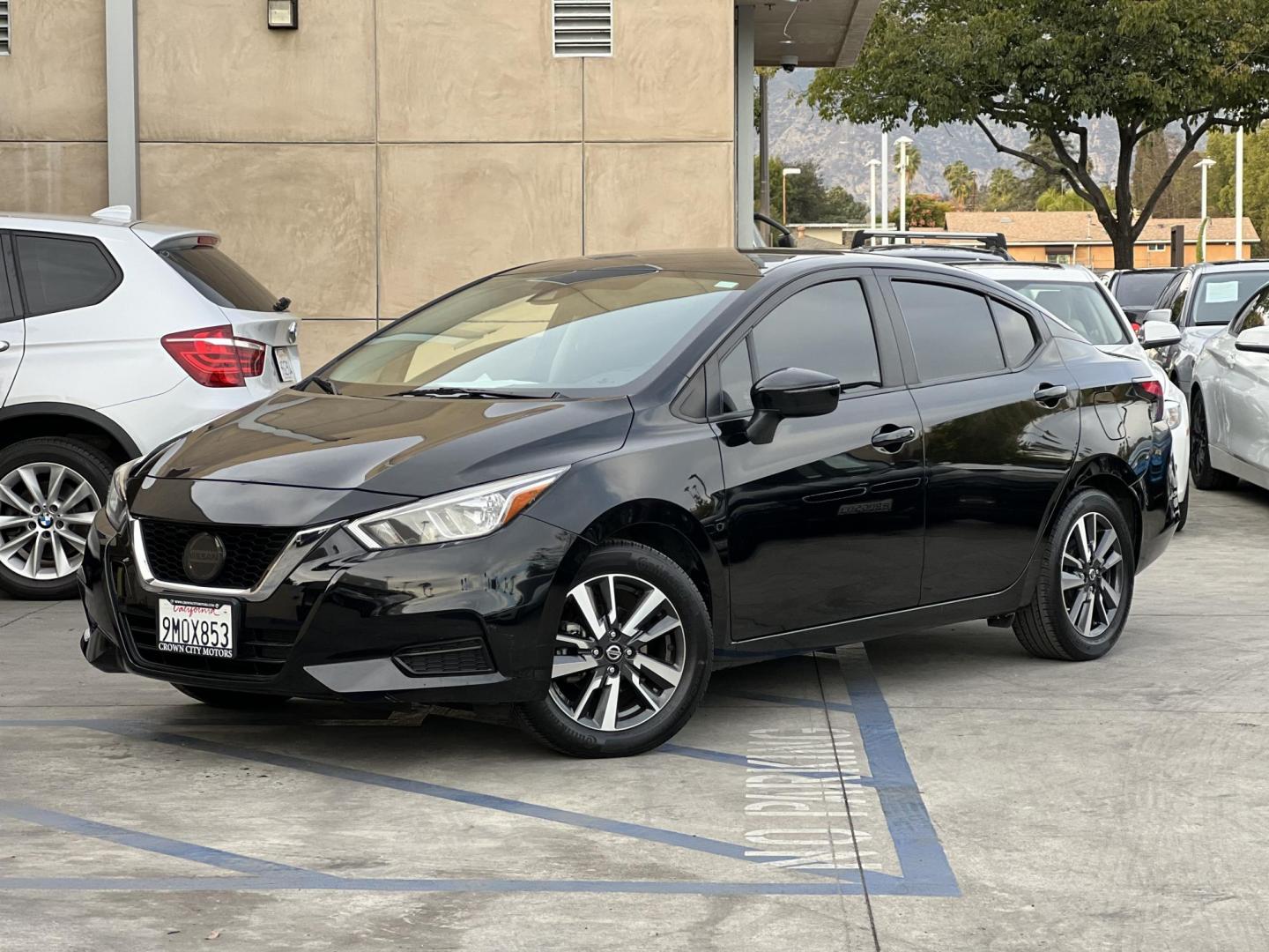 2021 Black /Black Nissan Versa SV (3N1CN8EV0ML) with an 1.6L L4 DOHC 16V engine, CVT transmission, located at 30 S. Berkeley Avenue, Pasadena, CA, 91107, (626) 248-7567, 34.145447, -118.109398 - 021 Nissan Versa SV: The Perfect Blend of Style, Efficiency, and Affordability If you’re searching for a reliable, fuel-efficient, and stylish compact sedan, the 2021 Nissan Versa SV checks all the boxes. This vehicle offers a modern design, advanced technology features, and an impressive perform - Photo#0