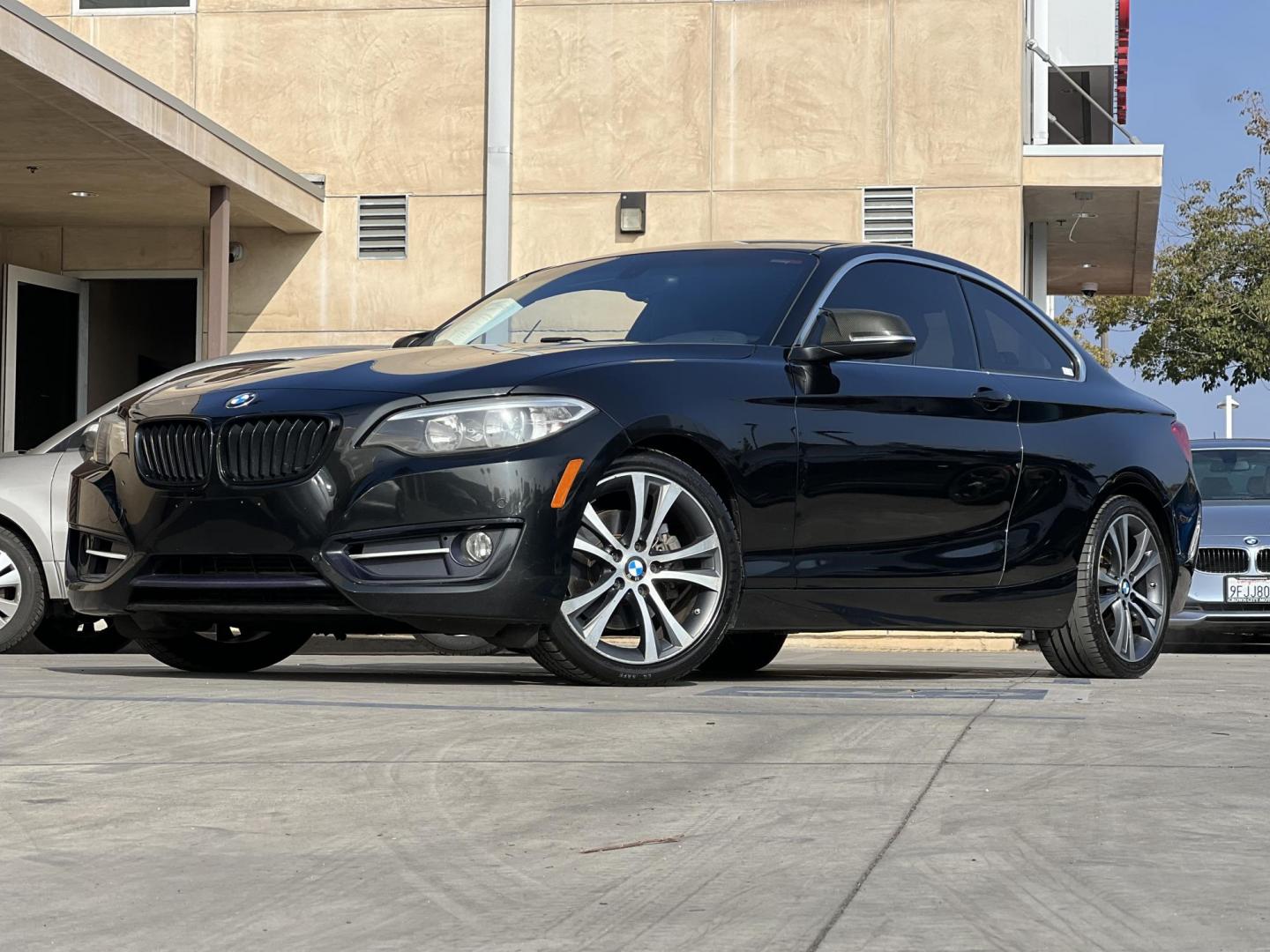 2015 Black /Black BMW 2-Series 228i Coupe (WBA1F5C50FV) with an 2.0L L4 DOHC 16V engine, 8-Speed Automatic transmission, located at 30 S. Berkeley Avenue, Pasadena, CA, 91107, (626) 248-7567, 34.145447, -118.109398 - 2015 BMW 228i Coupe: Luxury, Performance, and Easy Financing Options for All Buyers Looking for a sleek, high-performance luxury car but worried about your credit history? The 2015 BMW 228i Coupe is here to redefine your driving experience. At [Your Dealership Name], we specialize in making car o - Photo#2