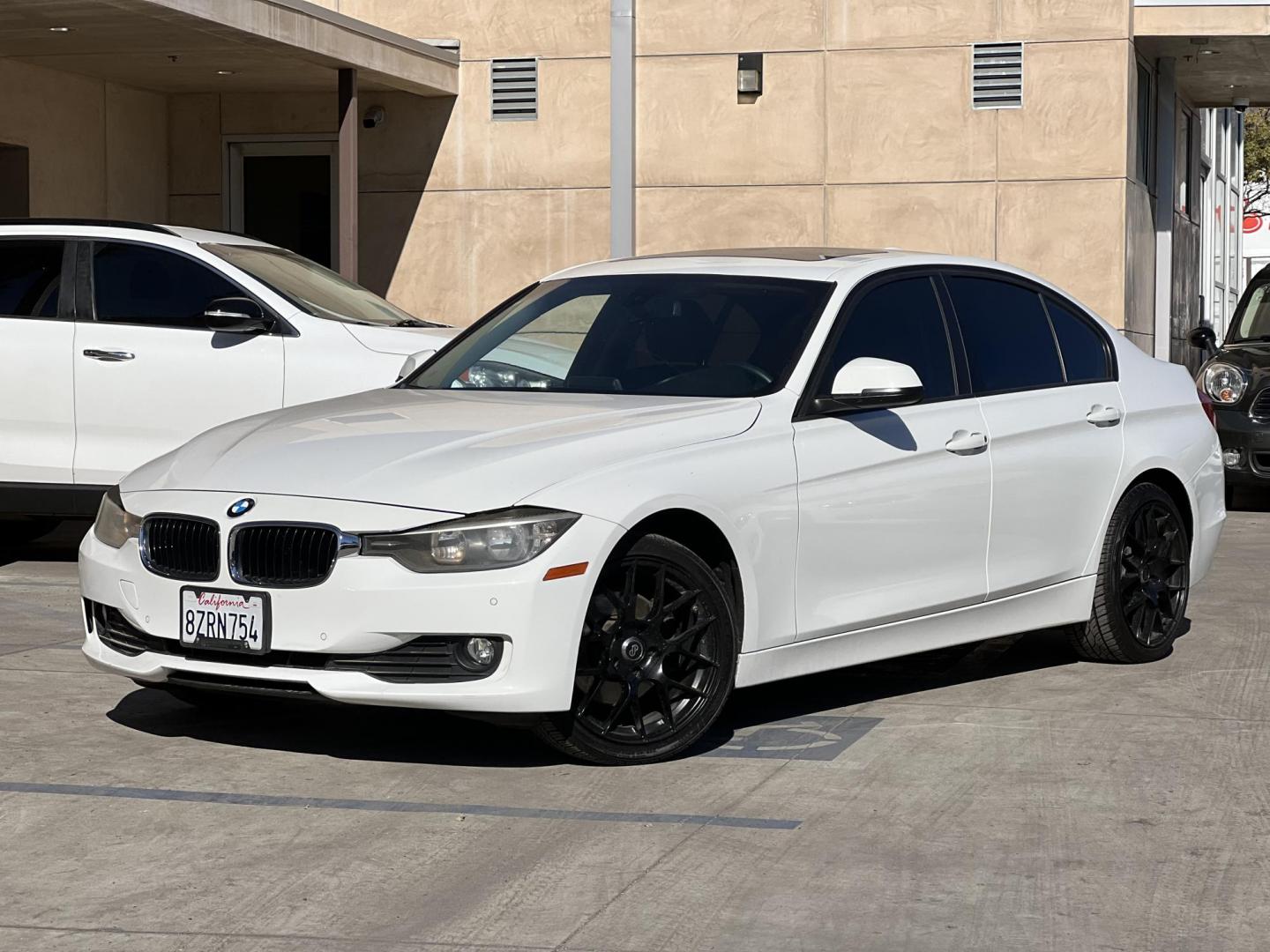 2014 Alpine White /Black BMW 3-Series 320i Sedan (WBA3C3G53EN) with an 2.0L L4 DOHC 16V engine, Automatic transmission, located at 30 S. Berkeley Avenue, Pasadena, CA, 91107, (626) 248-7567, 34.145447, -118.109398 - Experience luxury, performance, and affordability with this stunning 2014 BMW 320i, a vehicle that perfectly blends style, power, and advanced technology. Whether you're looking for a reliable commuter car or a sophisticated ride for your weekend adventures, the 2014 BMW 320i has you covered. And wi - Photo#0