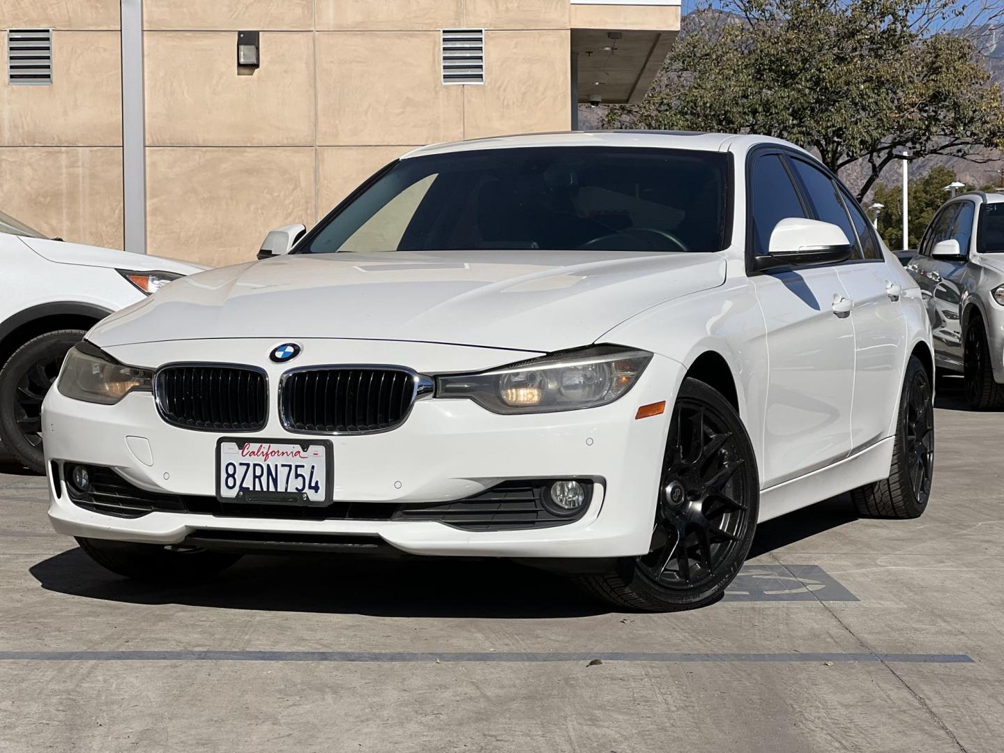 2014 Alpine White /Black BMW 3-Series 320i Sedan (WBA3C3G53EN) with an 2.0L L4 DOHC 16V engine, Automatic transmission, located at 30 S. Berkeley Avenue, Pasadena, CA, 91107, (626) 248-7567, 34.145447, -118.109398 - Experience luxury, performance, and affordability with this stunning 2014 BMW 320i, a vehicle that perfectly blends style, power, and advanced technology. Whether you're looking for a reliable commuter car or a sophisticated ride for your weekend adventures, the 2014 BMW 320i has you covered. And wi - Photo#2