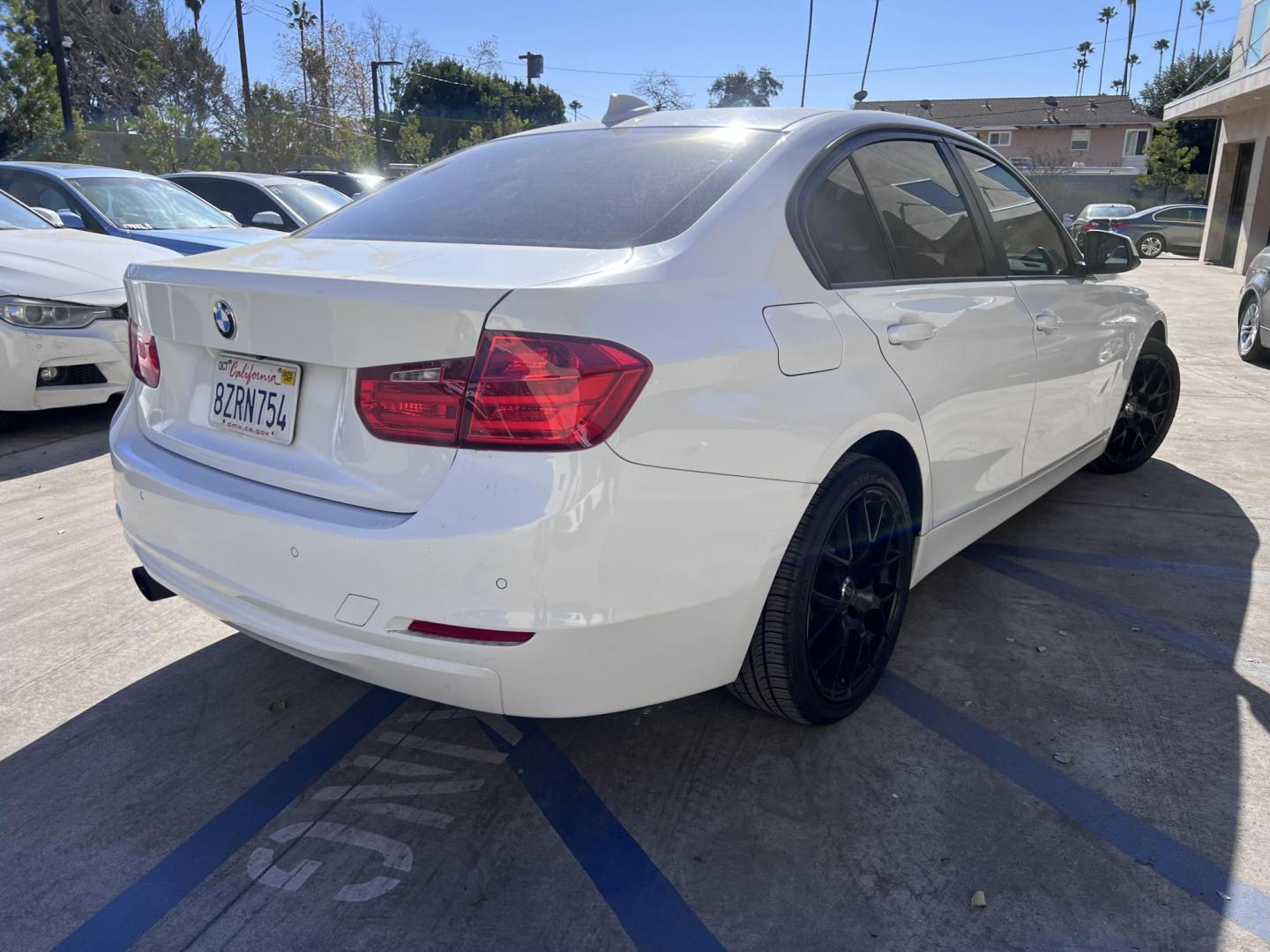 2014 Alpine White /Black BMW 3-Series 320i Sedan (WBA3C3G53EN) with an 2.0L L4 DOHC 16V engine, Automatic transmission, located at 30 S. Berkeley Avenue, Pasadena, CA, 91107, (626) 248-7567, 34.145447, -118.109398 - Experience luxury, performance, and affordability with this stunning 2014 BMW 320i, a vehicle that perfectly blends style, power, and advanced technology. Whether you're looking for a reliable commuter car or a sophisticated ride for your weekend adventures, the 2014 BMW 320i has you covered. And wi - Photo#7