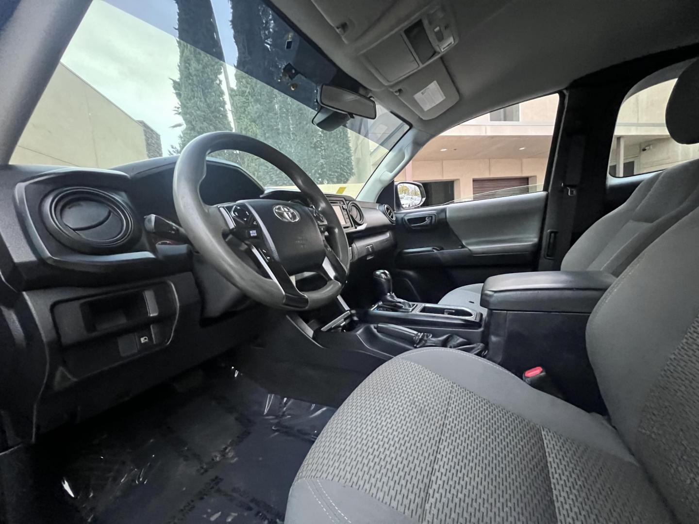 2018 Space Gray Metallic Toyota Tacoma SR5 Access Cab I4 6AT 2WD (5TFRX5GNXJX) with an 2.7L L4 DOHC 16V engine, 6A transmission, located at 30 S. Berkeley Avenue, Pasadena, CA, 91107, (626) 248-7567, 34.145447, -118.109398 - Crown City Motors is a used “Buy Here Pay Here” car dealer in Pasadena CA. “Buy Here Pay Here” financing, means that when you purchase your vehicle from our dealership, that you make the payments to the dealership as well. We do not need the banks approval to get you approved for a used auto - Photo#19