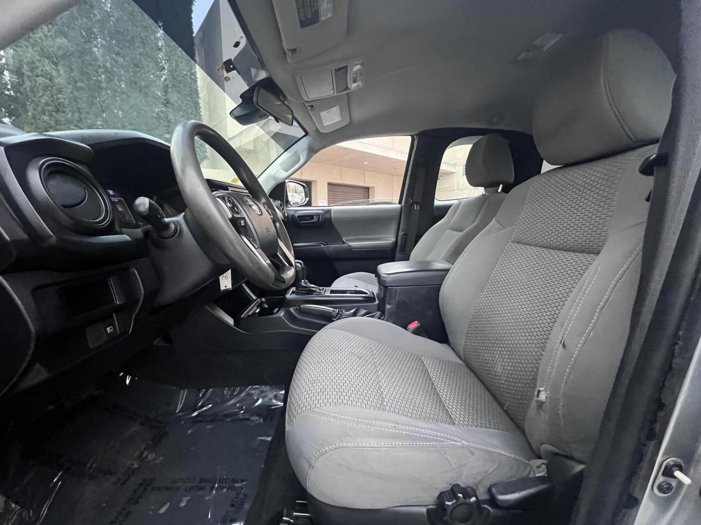 2018 Space Gray Metallic Toyota Tacoma SR5 Access Cab I4 6AT 2WD (5TFRX5GNXJX) with an 2.7L L4 DOHC 16V engine, 6A transmission, located at 30 S. Berkeley Avenue, Pasadena, CA, 91107, (626) 248-7567, 34.145447, -118.109398 - Crown City Motors is a used “Buy Here Pay Here” car dealer in Pasadena CA. “Buy Here Pay Here” financing, means that when you purchase your vehicle from our dealership, that you make the payments to the dealership as well. We do not need the banks approval to get you approved for a used auto - Photo#20