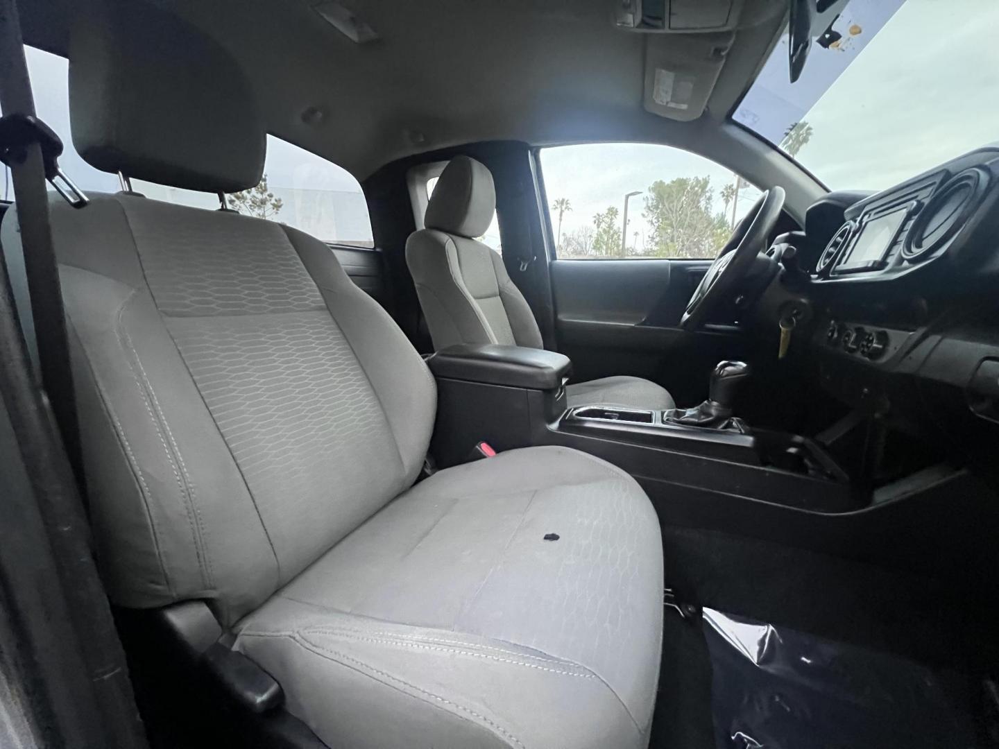 2018 Space Gray Metallic Toyota Tacoma SR5 Access Cab I4 6AT 2WD (5TFRX5GNXJX) with an 2.7L L4 DOHC 16V engine, 6A transmission, located at 30 S. Berkeley Avenue, Pasadena, CA, 91107, (626) 248-7567, 34.145447, -118.109398 - Crown City Motors is a used “Buy Here Pay Here” car dealer in Pasadena CA. “Buy Here Pay Here” financing, means that when you purchase your vehicle from our dealership, that you make the payments to the dealership as well. We do not need the banks approval to get you approved for a used auto - Photo#25