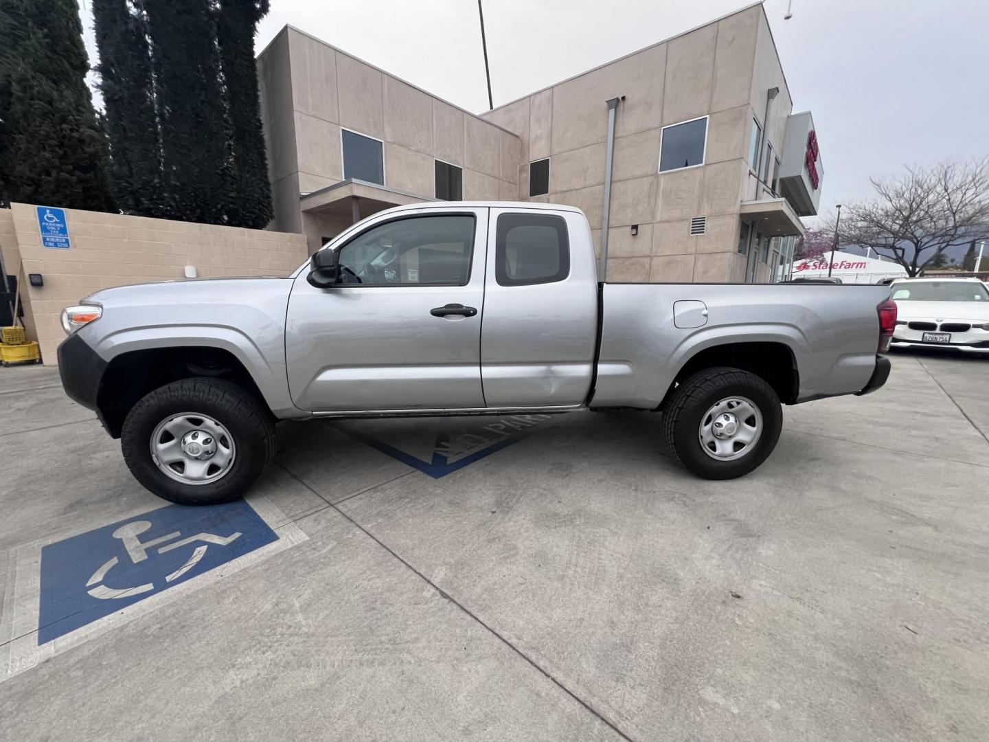 2018 Space Gray Metallic Toyota Tacoma SR5 Access Cab I4 6AT 2WD (5TFRX5GNXJX) with an 2.7L L4 DOHC 16V engine, 6A transmission, located at 30 S. Berkeley Avenue, Pasadena, CA, 91107, (626) 248-7567, 34.145447, -118.109398 - Crown City Motors is a used “Buy Here Pay Here” car dealer in Pasadena CA. “Buy Here Pay Here” financing, means that when you purchase your vehicle from our dealership, that you make the payments to the dealership as well. We do not need the banks approval to get you approved for a used auto - Photo#4