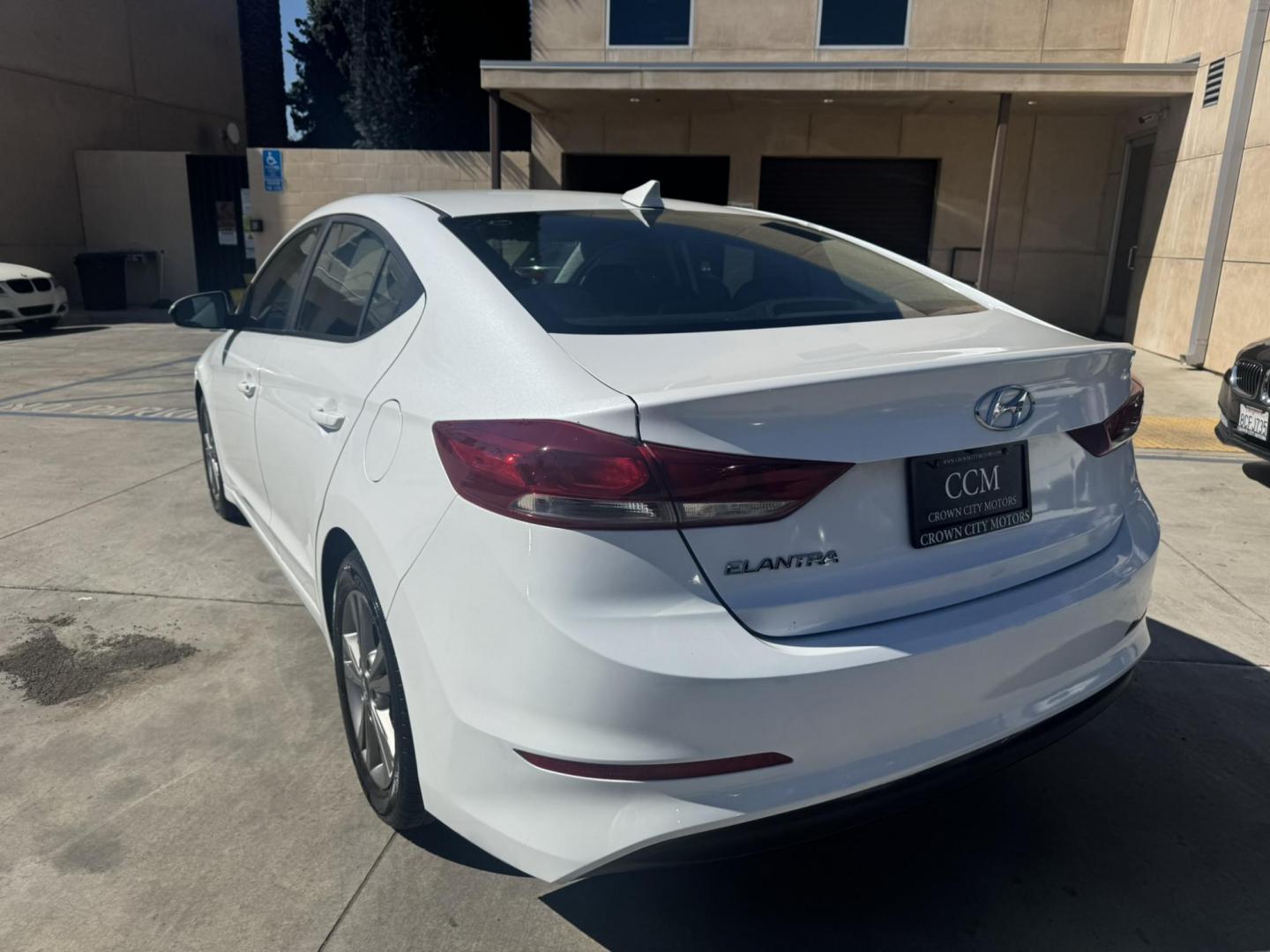2018 White /BLACK Hyundai Elantra Limited (5NPD84LF3JH) with an 1.8L L4 DOHC 16V engine, 6A transmission, located at 30 S. Berkeley Avenue, Pasadena, CA, 91107, (626) 248-7567, 34.145447, -118.109398 - Looking for a reliable, affordable, and stylish sedan? Visit Crow City Motors at 30 S Berkeley Ave, Pasadena, CA 91107, and check out our 2018 Hyundai Elantra sedan. At Crow City Motors, we specialize in helping customers secure the vehicle they need with flexible financing options, including Buy He - Photo#7