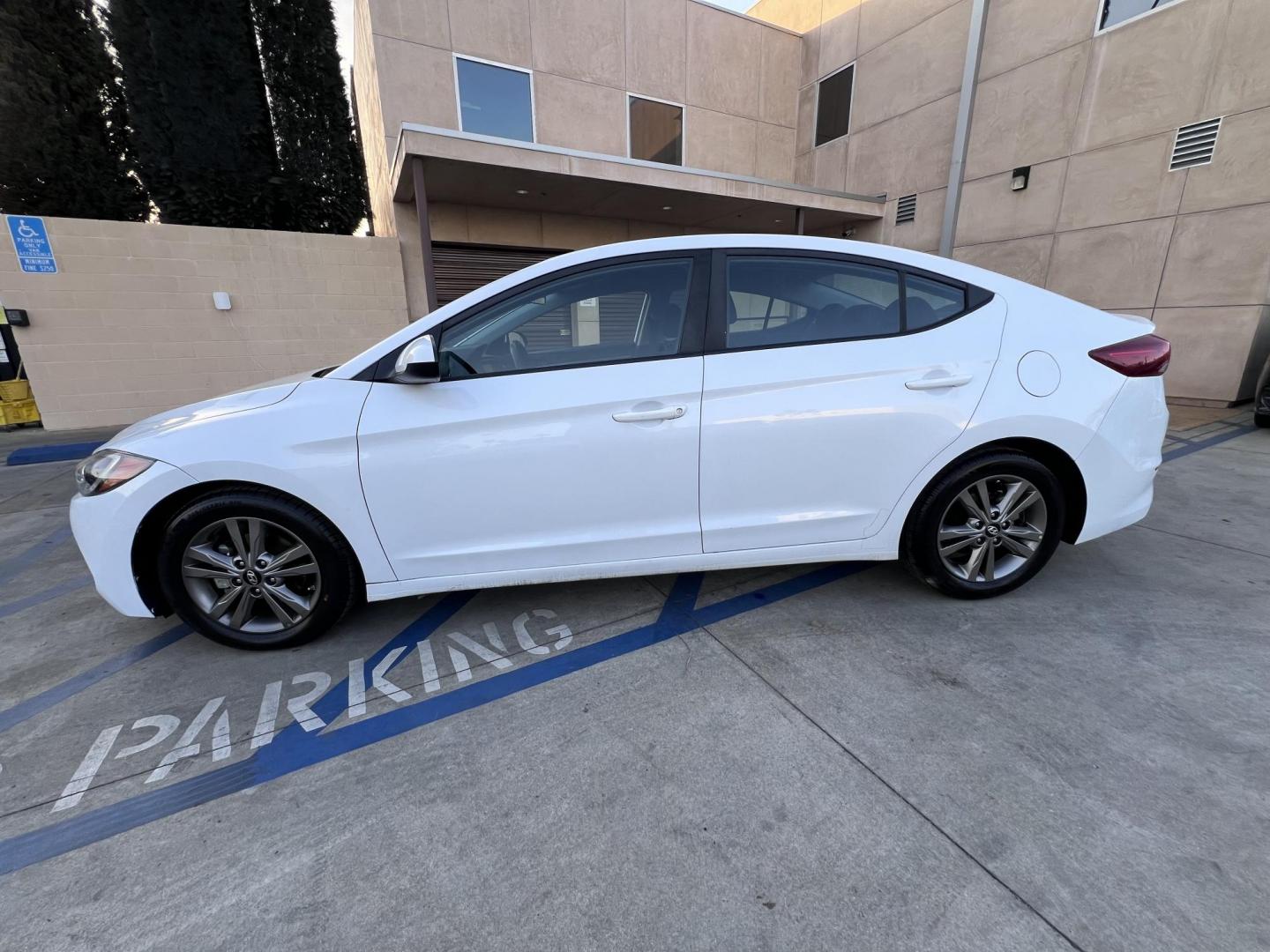 2018 White /BLACK Hyundai Elantra Limited (5NPD84LF3JH) with an 1.8L L4 DOHC 16V engine, 6A transmission, located at 30 S. Berkeley Avenue, Pasadena, CA, 91107, (626) 248-7567, 34.145447, -118.109398 - Looking for a reliable, affordable, and stylish sedan? Visit Crow City Motors at 30 S Berkeley Ave, Pasadena, CA 91107, and check out our 2018 Hyundai Elantra sedan. At Crow City Motors, we specialize in helping customers secure the vehicle they need with flexible financing options, including Buy He - Photo#22