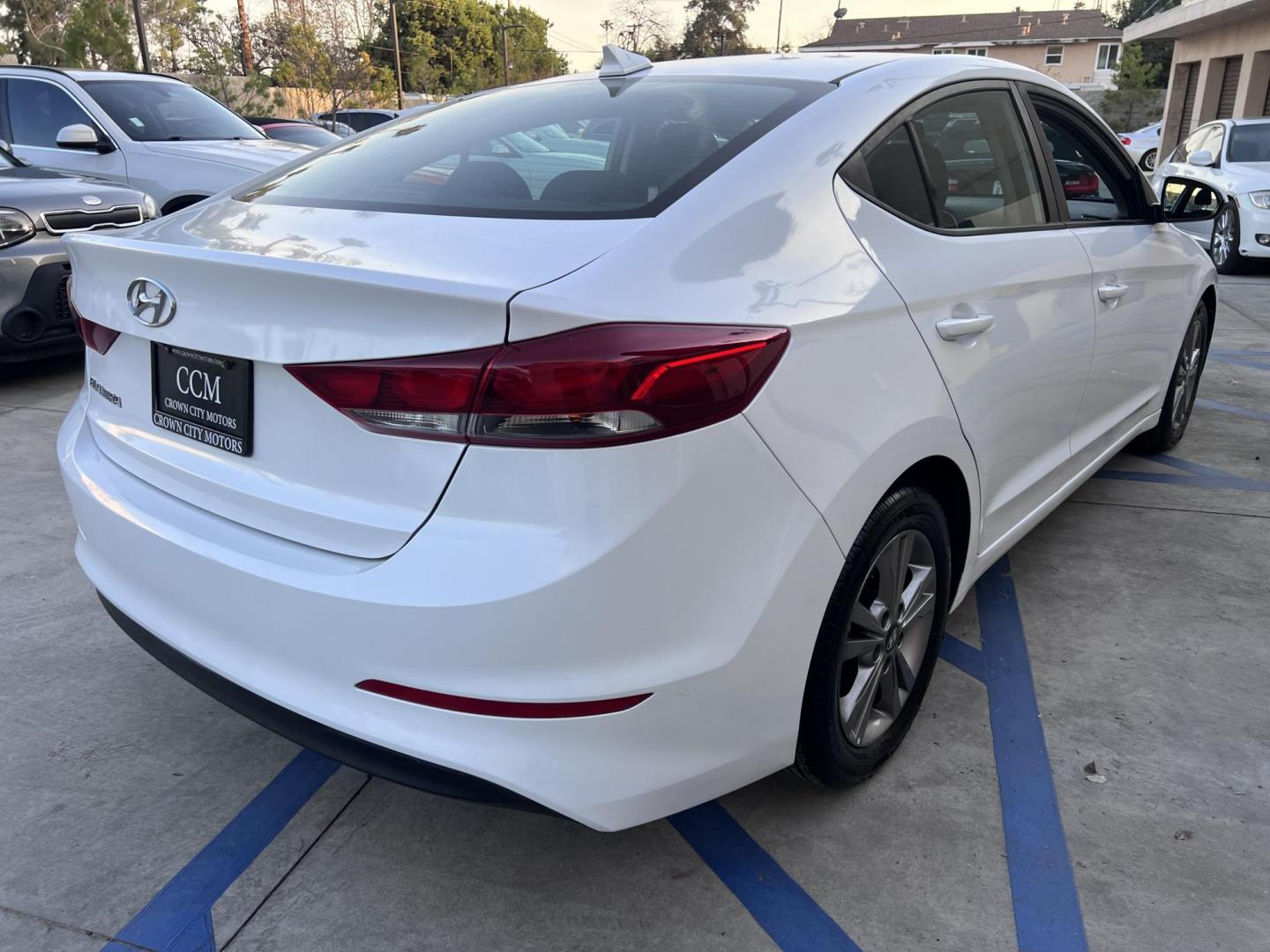 2018 White /BLACK Hyundai Elantra Limited (5NPD84LF3JH) with an 1.8L L4 DOHC 16V engine, 6A transmission, located at 30 S. Berkeley Avenue, Pasadena, CA, 91107, (626) 248-7567, 34.145447, -118.109398 - Looking for a reliable, affordable, and stylish sedan? Visit Crow City Motors at 30 S Berkeley Ave, Pasadena, CA 91107, and check out our 2018 Hyundai Elantra sedan. At Crow City Motors, we specialize in helping customers secure the vehicle they need with flexible financing options, including Buy He - Photo#25