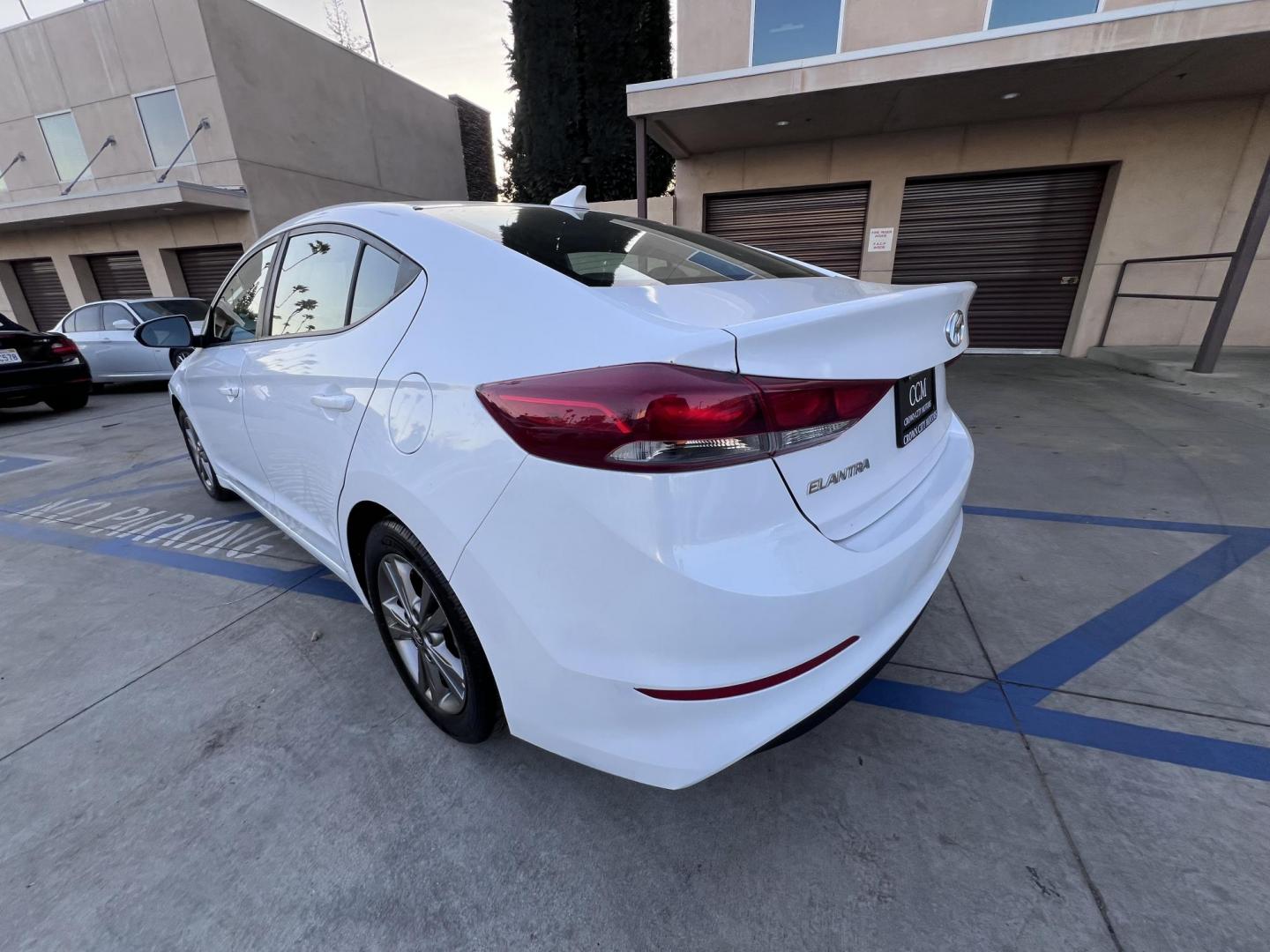 2018 White /BLACK Hyundai Elantra Limited (5NPD84LF3JH) with an 1.8L L4 DOHC 16V engine, 6A transmission, located at 30 S. Berkeley Avenue, Pasadena, CA, 91107, (626) 248-7567, 34.145447, -118.109398 - Looking for a reliable, affordable, and stylish sedan? Visit Crow City Motors at 30 S Berkeley Ave, Pasadena, CA 91107, and check out our 2018 Hyundai Elantra sedan. At Crow City Motors, we specialize in helping customers secure the vehicle they need with flexible financing options, including Buy He - Photo#27
