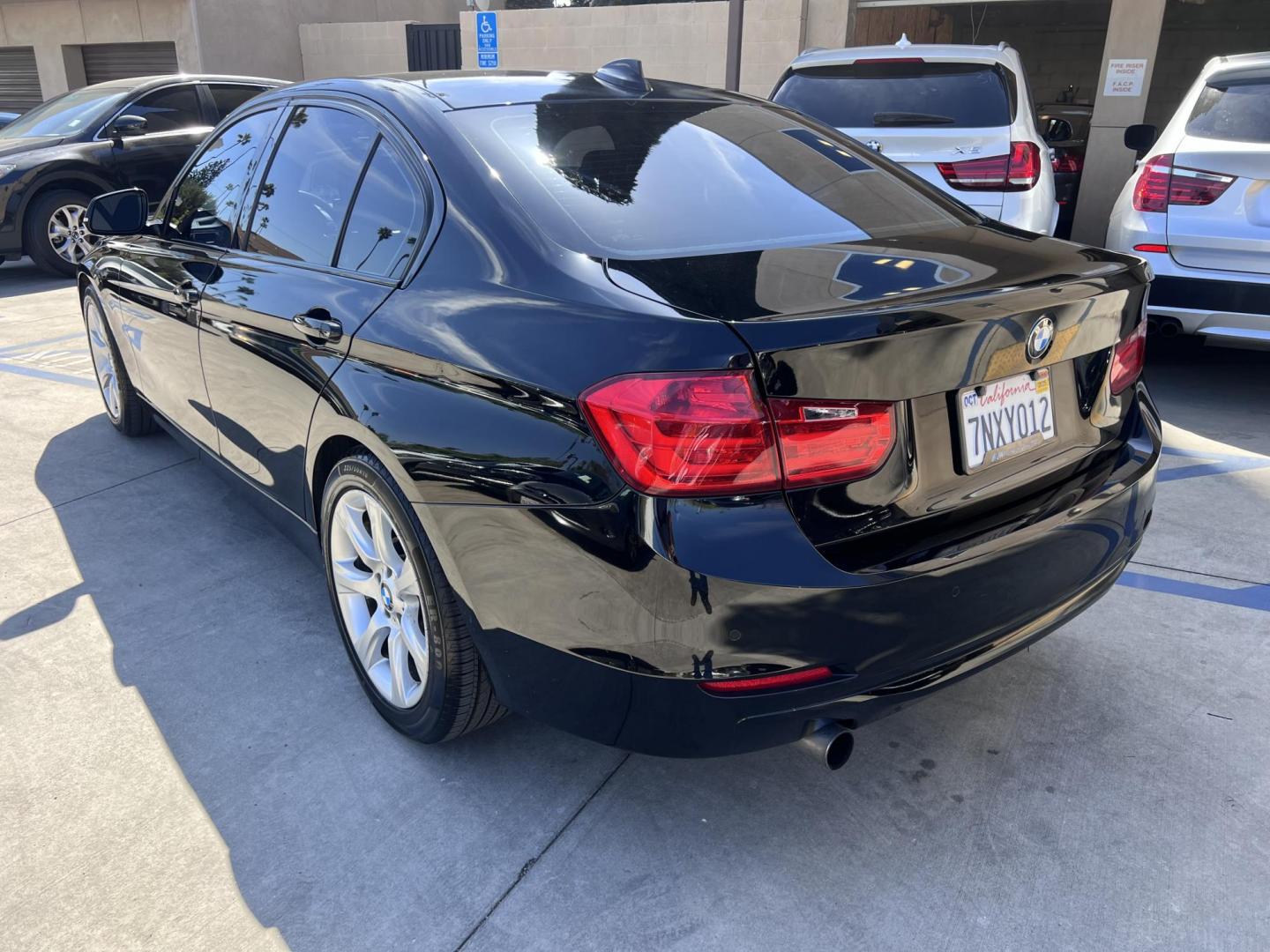 2015 BLACK /Black BMW 3-Series 320i Sedan (WBA3B1G59FN) with an 2.0L L4 DOHC 16V engine, 8-Speed Automatic transmission, located at 30 S. Berkeley Avenue, Pasadena, CA, 91107, (626) 248-7567, 34.145447, -118.109398 - 2015 BMW 328 for Sale at Crown City Motors – Affordable Financing for Bad Credit! Searching for a dependable and stylish used car in Pasadena, CA? Look no further than Crown City Motors, located at 30 S Berkeley Ave, Pasadena, CA 91107! We’re excited to offer this 2015 BMW 328 (VIN: WBA3B1G59FN - Photo#5