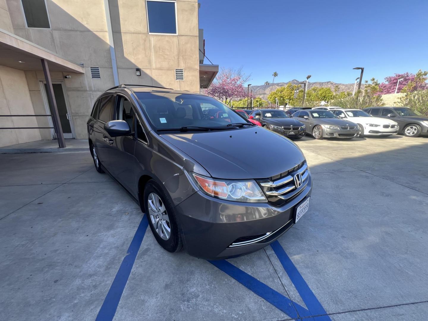2016 Gray /Gray Honda Odyssey SE (5FNRL5H38GB) with an 3.5L V6 SOHC 24V engine, 6A transmission, located at 30 S. Berkeley Avenue, Pasadena, CA, 91107, (626) 248-7567, 34.145447, -118.109398 - For sale at Crown City Motors, 30 S Berkeley Ave, Pasadena, CA 91107: a reliable 2016 Honda Odyssey with rear AC, perfect for families needing a spacious 7-passenger minivan. This well-maintained vehicle offers a smooth ride, ample cargo space, and modern features to ensure comfort on every journey. - Photo#13