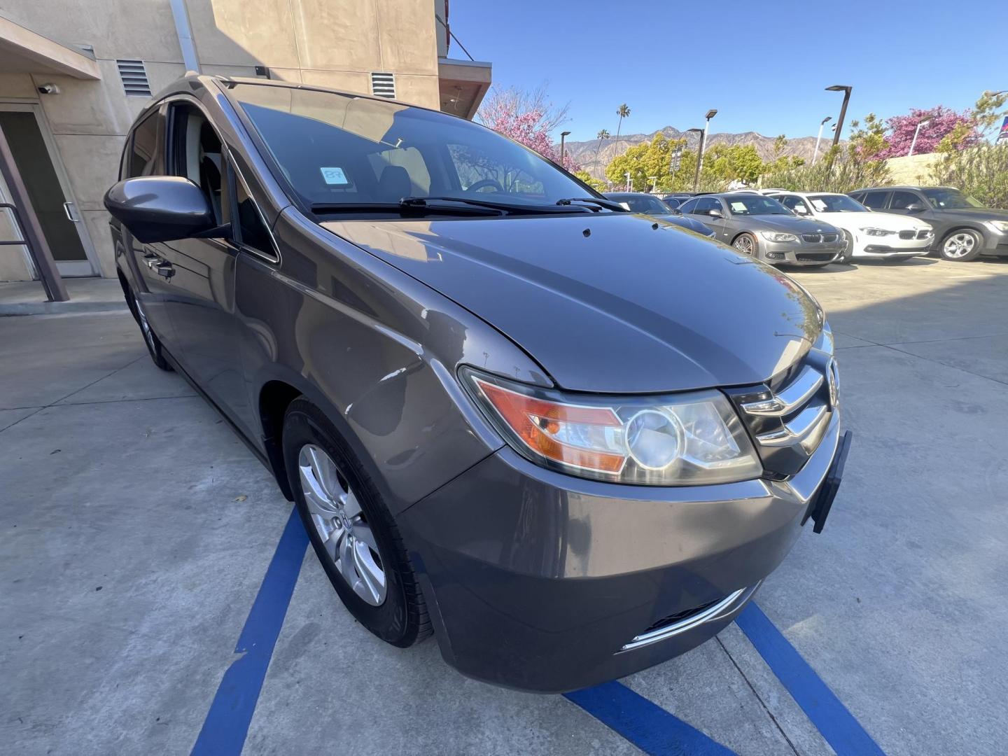 2016 Gray /Gray Honda Odyssey SE (5FNRL5H38GB) with an 3.5L V6 SOHC 24V engine, 6A transmission, located at 30 S. Berkeley Avenue, Pasadena, CA, 91107, (626) 248-7567, 34.145447, -118.109398 - For sale at Crown City Motors, 30 S Berkeley Ave, Pasadena, CA 91107: a reliable 2016 Honda Odyssey with rear AC, perfect for families needing a spacious 7-passenger minivan. This well-maintained vehicle offers a smooth ride, ample cargo space, and modern features to ensure comfort on every journey. - Photo#14