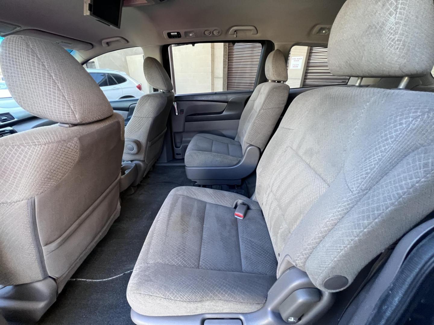 2016 Gray /Gray Honda Odyssey SE (5FNRL5H38GB) with an 3.5L V6 SOHC 24V engine, 6A transmission, located at 30 S. Berkeley Avenue, Pasadena, CA, 91107, (626) 248-7567, 34.145447, -118.109398 - For sale at Crown City Motors, 30 S Berkeley Ave, Pasadena, CA 91107: a reliable 2016 Honda Odyssey with rear AC, perfect for families needing a spacious 7-passenger minivan. This well-maintained vehicle offers a smooth ride, ample cargo space, and modern features to ensure comfort on every journey. - Photo#17