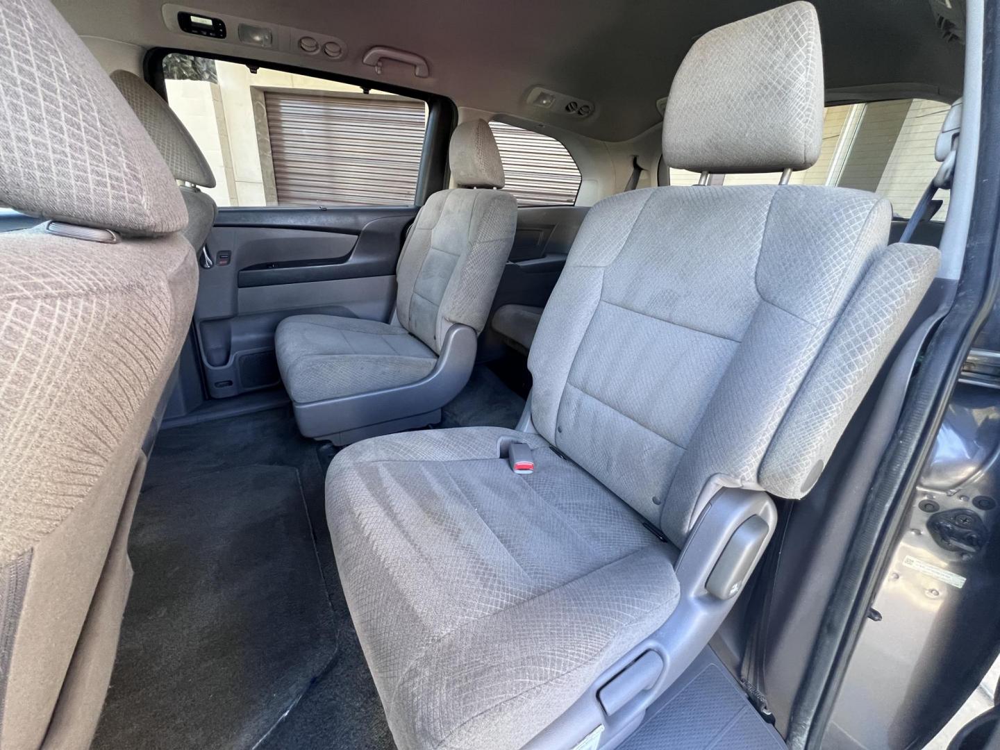 2016 Gray /Gray Honda Odyssey SE (5FNRL5H38GB) with an 3.5L V6 SOHC 24V engine, 6A transmission, located at 30 S. Berkeley Avenue, Pasadena, CA, 91107, (626) 248-7567, 34.145447, -118.109398 - For sale at Crown City Motors, 30 S Berkeley Ave, Pasadena, CA 91107: a reliable 2016 Honda Odyssey with rear AC, perfect for families needing a spacious 7-passenger minivan. This well-maintained vehicle offers a smooth ride, ample cargo space, and modern features to ensure comfort on every journey. - Photo#19
