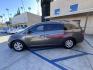 2016 Gray /Gray Honda Odyssey SE (5FNRL5H38GB) with an 3.5L V6 SOHC 24V engine, 6A transmission, located at 30 S. Berkeley Avenue, Pasadena, CA, 91107, (626) 248-7567, 34.145447, -118.109398 - For sale at Crown City Motors, 30 S Berkeley Ave, Pasadena, CA 91107: a reliable 2016 Honda Odyssey with rear AC, perfect for families needing a spacious 7-passenger minivan. This well-maintained vehicle offers a smooth ride, ample cargo space, and modern features to ensure comfort on every journey. - Photo#5