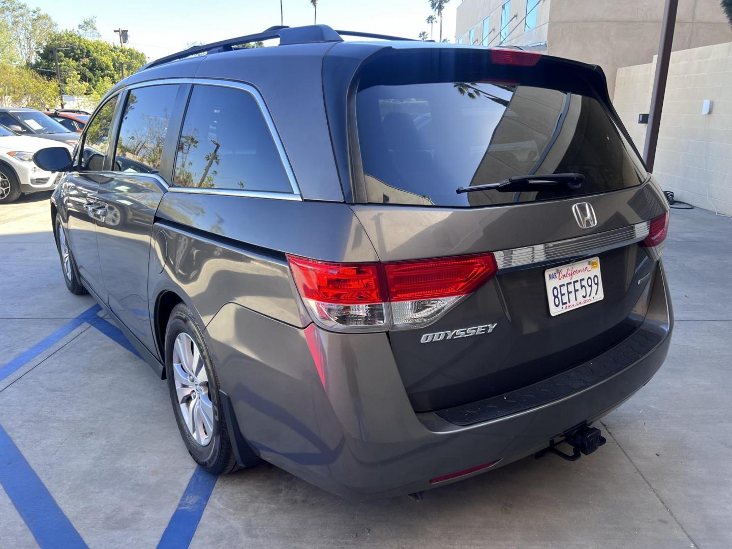 2016 Gray /Gray Honda Odyssey SE (5FNRL5H38GB) with an 3.5L V6 SOHC 24V engine, 6A transmission, located at 30 S. Berkeley Avenue, Pasadena, CA, 91107, (626) 248-7567, 34.145447, -118.109398 - For sale at Crown City Motors, 30 S Berkeley Ave, Pasadena, CA 91107: a reliable 2016 Honda Odyssey with rear AC, perfect for families needing a spacious 7-passenger minivan. This well-maintained vehicle offers a smooth ride, ample cargo space, and modern features to ensure comfort on every journey. - Photo#6