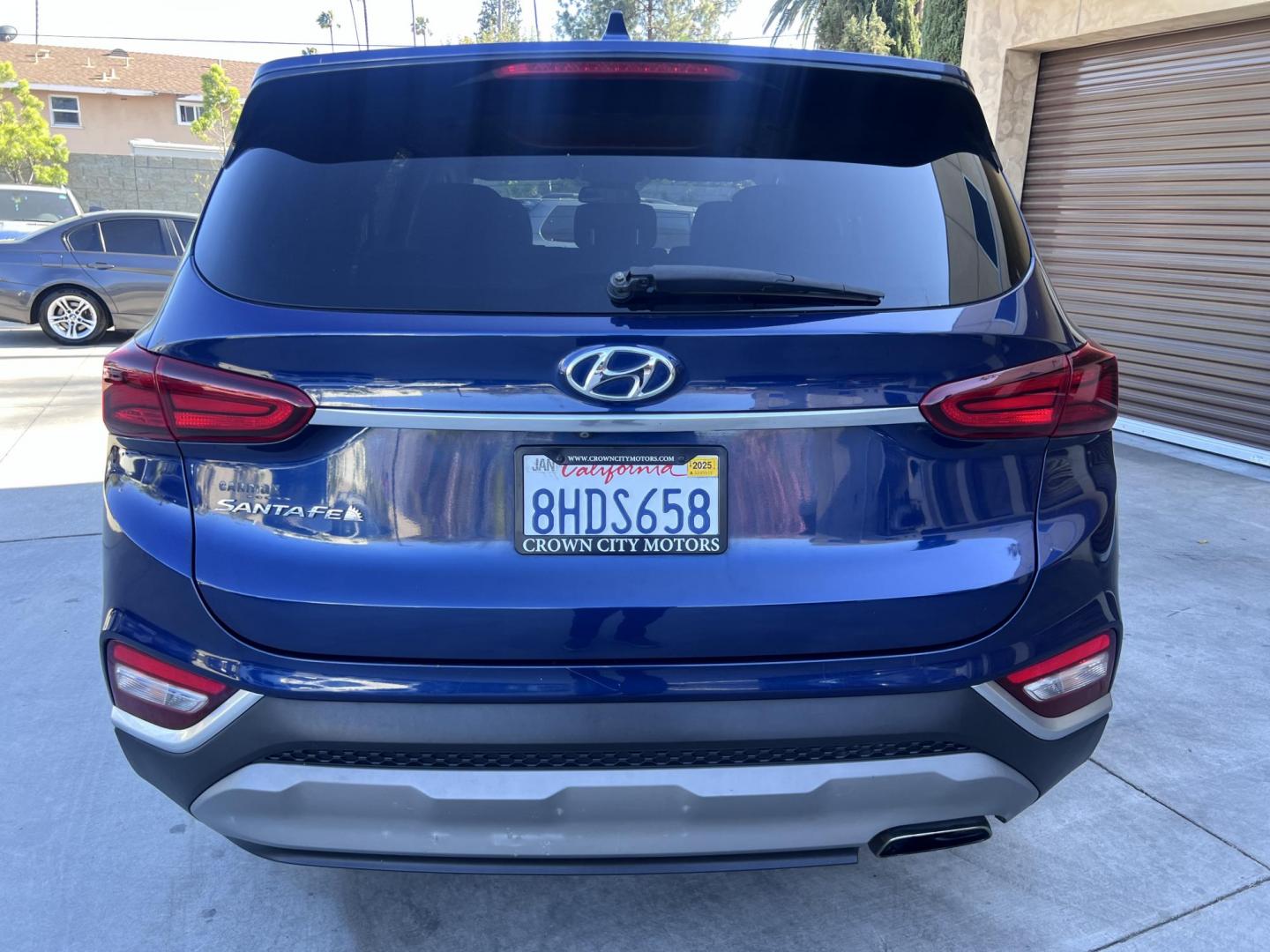 2019 Stormy BLue /Black Hyundai Santa Fe SEL 2.4 (5NMS33AD0KH) with an 2.4L L4 DOHC 16V engine, 8A transmission, located at 30 S. Berkeley Avenue, Pasadena, CA, 91107, (626) 248-7567, 34.145447, -118.109398 - Are you in the market for a stylish, reliable, and family-friendly SUV? Look no further than this 2019 Hyundai Santa Fe, available now at Crown City Motors, located at 30 S Berkeley Ave, Pasadena, CA 91107. As a premier Buy Here Pay Here dealership in Pasadena, we’re proud to offer this exceptiona - Photo#12