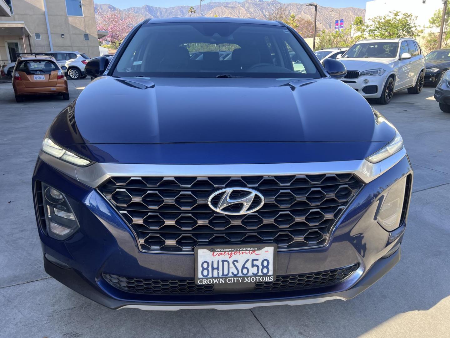 2019 Stormy BLue /Black Hyundai Santa Fe SEL 2.4 (5NMS33AD0KH) with an 2.4L L4 DOHC 16V engine, 8A transmission, located at 30 S. Berkeley Avenue, Pasadena, CA, 91107, (626) 248-7567, 34.145447, -118.109398 - Are you in the market for a stylish, reliable, and family-friendly SUV? Look no further than this 2019 Hyundai Santa Fe, available now at Crown City Motors, located at 30 S Berkeley Ave, Pasadena, CA 91107. As a premier Buy Here Pay Here dealership in Pasadena, we’re proud to offer this exceptiona - Photo#17