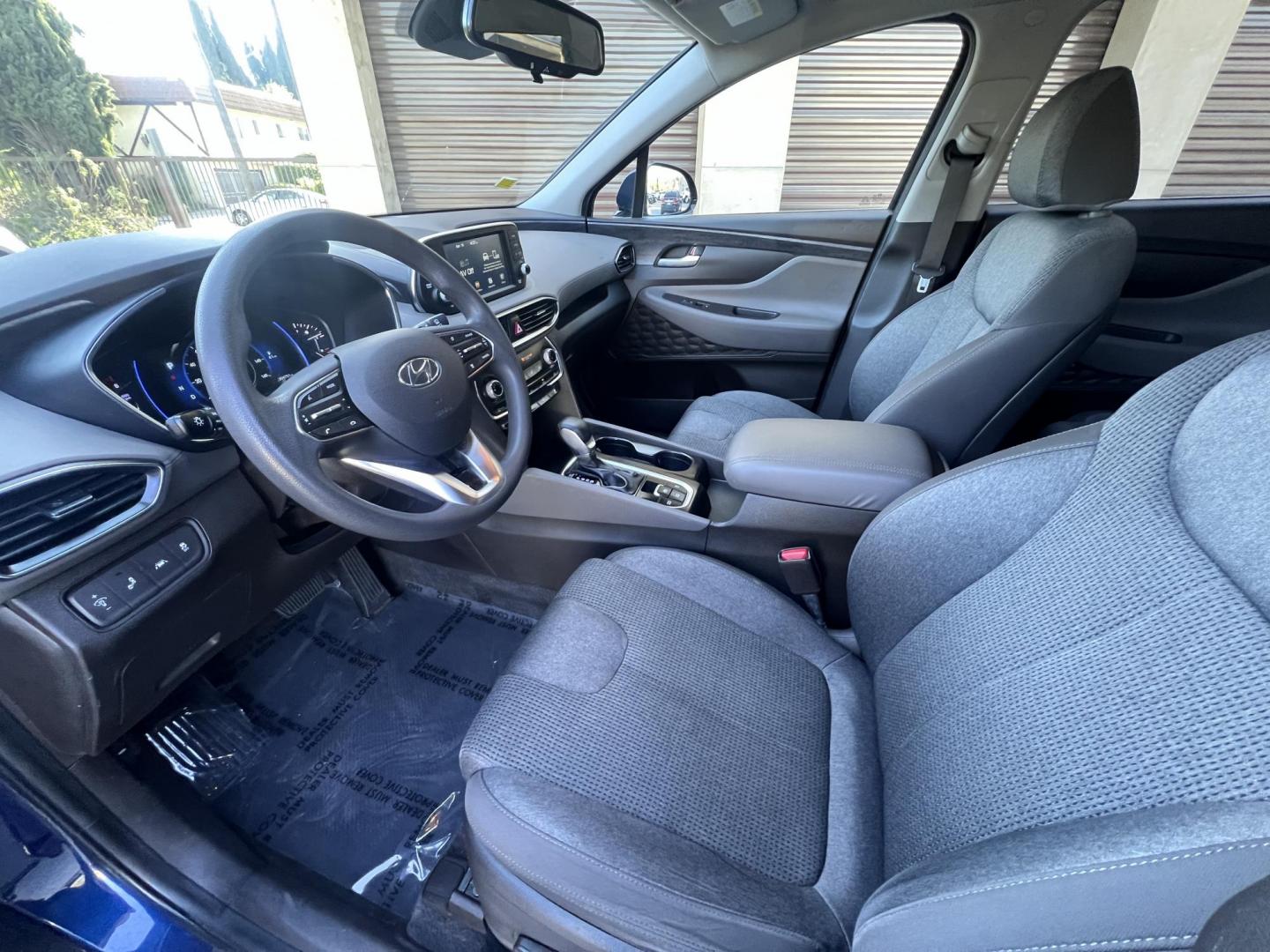 2019 Stormy BLue /Black Hyundai Santa Fe SEL 2.4 (5NMS33AD0KH) with an 2.4L L4 DOHC 16V engine, 8A transmission, located at 30 S. Berkeley Avenue, Pasadena, CA, 91107, (626) 248-7567, 34.145447, -118.109398 - Are you in the market for a stylish, reliable, and family-friendly SUV? Look no further than this 2019 Hyundai Santa Fe, available now at Crown City Motors, located at 30 S Berkeley Ave, Pasadena, CA 91107. As a premier Buy Here Pay Here dealership in Pasadena, we’re proud to offer this exceptiona - Photo#20