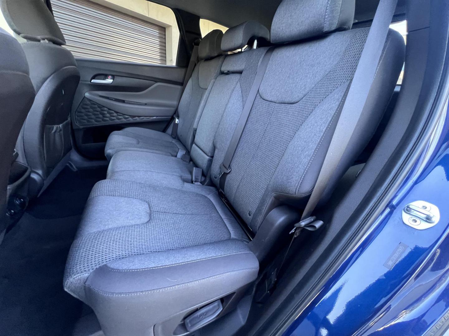 2019 Stormy BLue /Black Hyundai Santa Fe SEL 2.4 (5NMS33AD0KH) with an 2.4L L4 DOHC 16V engine, 8A transmission, located at 30 S. Berkeley Avenue, Pasadena, CA, 91107, (626) 248-7567, 34.145447, -118.109398 - Are you in the market for a stylish, reliable, and family-friendly SUV? Look no further than this 2019 Hyundai Santa Fe, available now at Crown City Motors, located at 30 S Berkeley Ave, Pasadena, CA 91107. As a premier Buy Here Pay Here dealership in Pasadena, we’re proud to offer this exceptiona - Photo#21