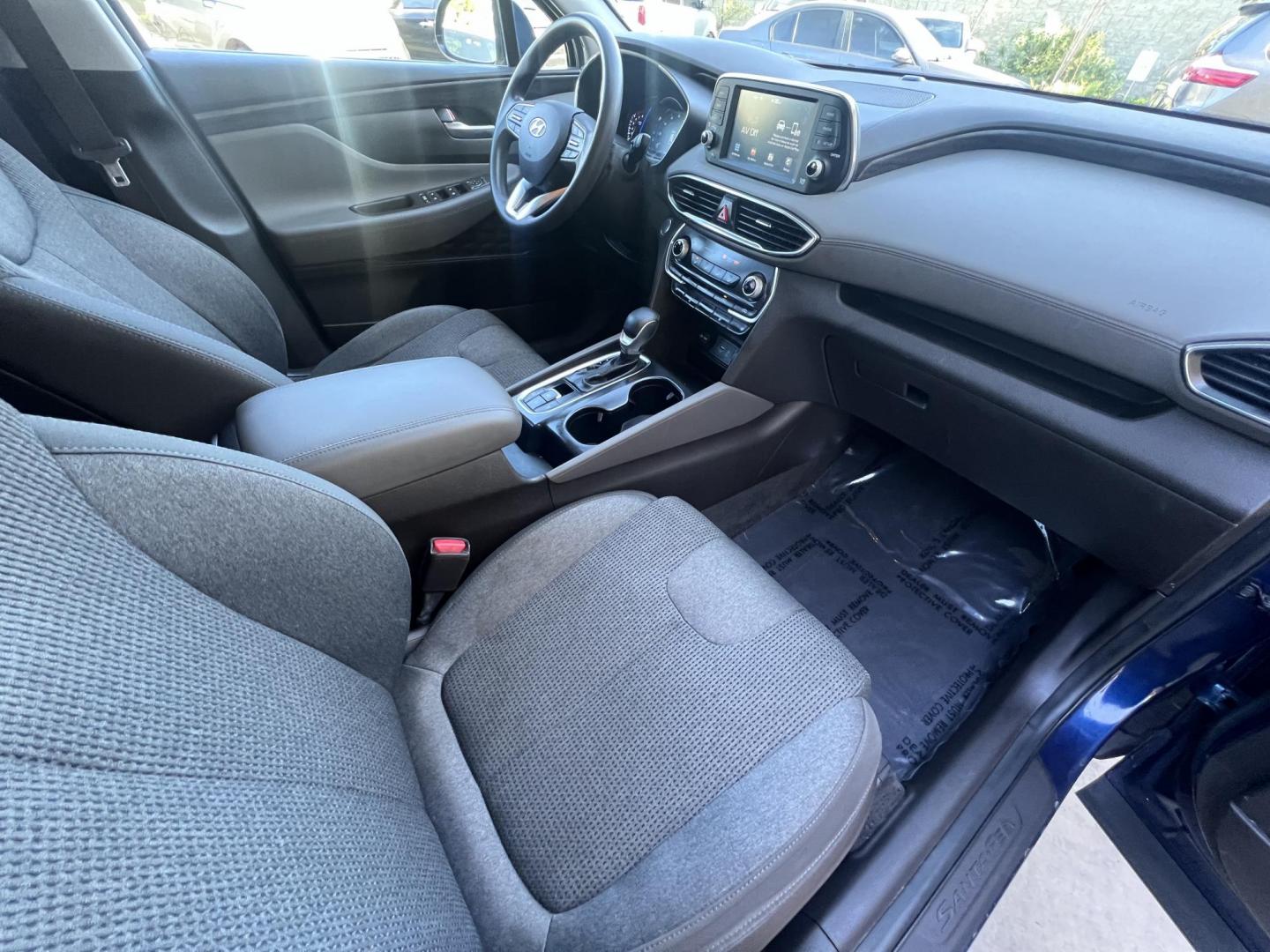 2019 Stormy BLue /Black Hyundai Santa Fe SEL 2.4 (5NMS33AD0KH) with an 2.4L L4 DOHC 16V engine, 8A transmission, located at 30 S. Berkeley Avenue, Pasadena, CA, 91107, (626) 248-7567, 34.145447, -118.109398 - Are you in the market for a stylish, reliable, and family-friendly SUV? Look no further than this 2019 Hyundai Santa Fe, available now at Crown City Motors, located at 30 S Berkeley Ave, Pasadena, CA 91107. As a premier Buy Here Pay Here dealership in Pasadena, we’re proud to offer this exceptiona - Photo#25