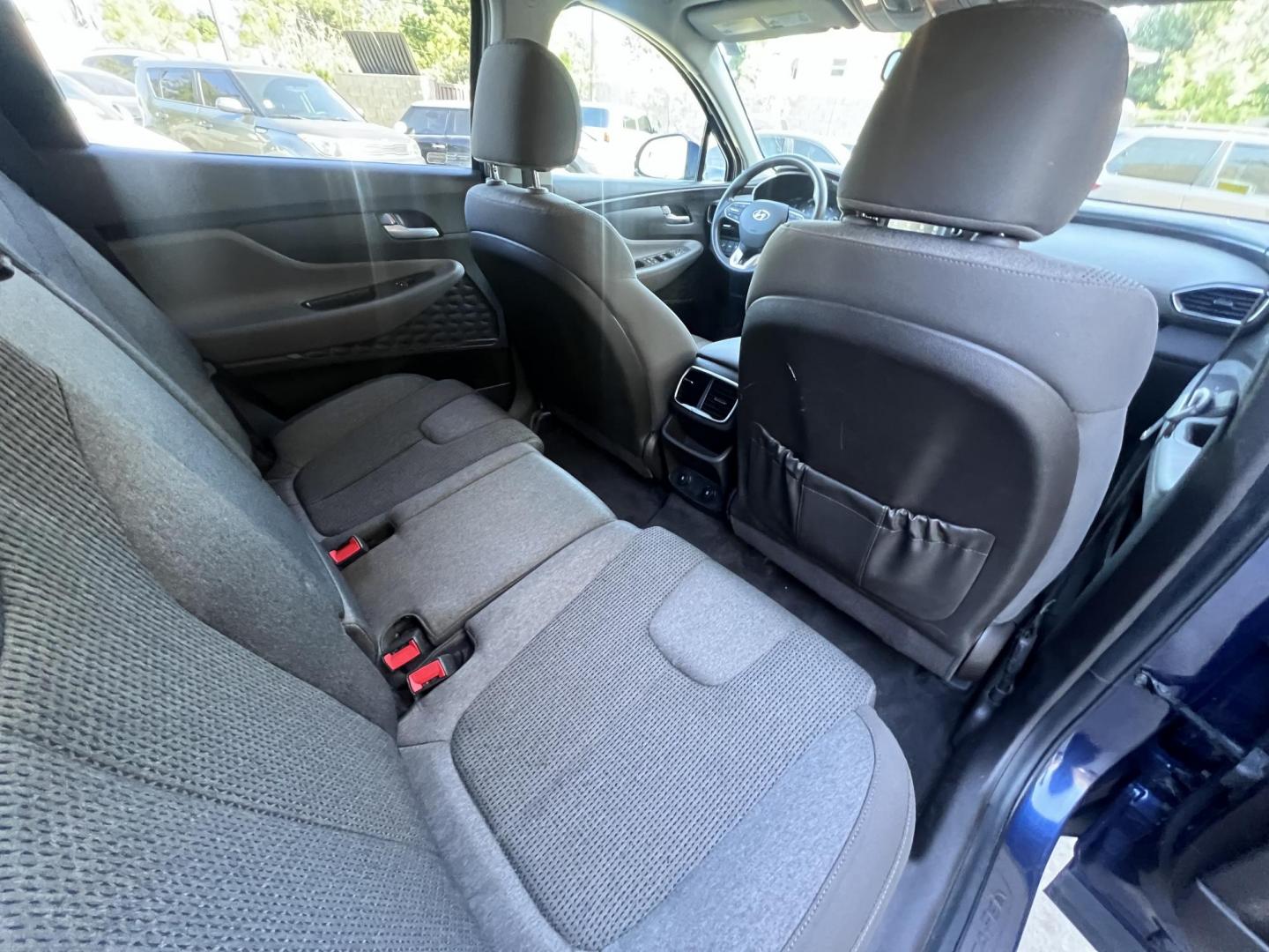 2019 Stormy BLue /Black Hyundai Santa Fe SEL 2.4 (5NMS33AD0KH) with an 2.4L L4 DOHC 16V engine, 8A transmission, located at 30 S. Berkeley Avenue, Pasadena, CA, 91107, (626) 248-7567, 34.145447, -118.109398 - Are you in the market for a stylish, reliable, and family-friendly SUV? Look no further than this 2019 Hyundai Santa Fe, available now at Crown City Motors, located at 30 S Berkeley Ave, Pasadena, CA 91107. As a premier Buy Here Pay Here dealership in Pasadena, we’re proud to offer this exceptiona - Photo#28