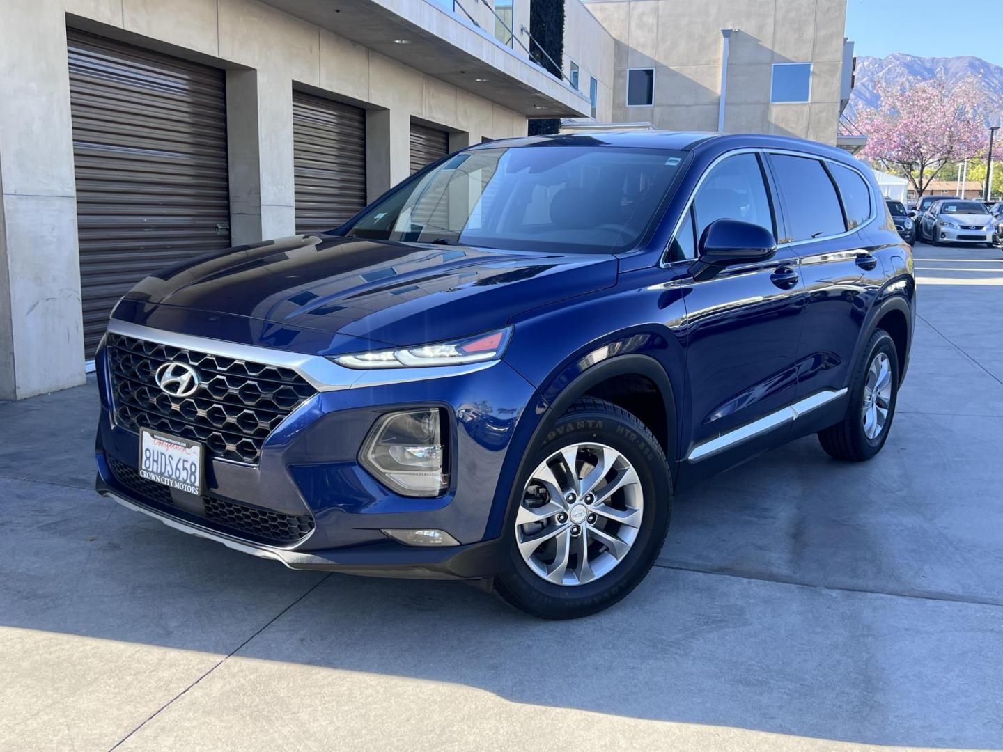 2019 Stormy BLue /Black Hyundai Santa Fe SEL 2.4 (5NMS33AD0KH) with an 2.4L L4 DOHC 16V engine, 8A transmission, located at 30 S. Berkeley Avenue, Pasadena, CA, 91107, (626) 248-7567, 34.145447, -118.109398 - Are you in the market for a stylish, reliable, and family-friendly SUV? Look no further than this 2019 Hyundai Santa Fe, available now at Crown City Motors, located at 30 S Berkeley Ave, Pasadena, CA 91107. As a premier Buy Here Pay Here dealership in Pasadena, we’re proud to offer this exceptiona - Photo#6