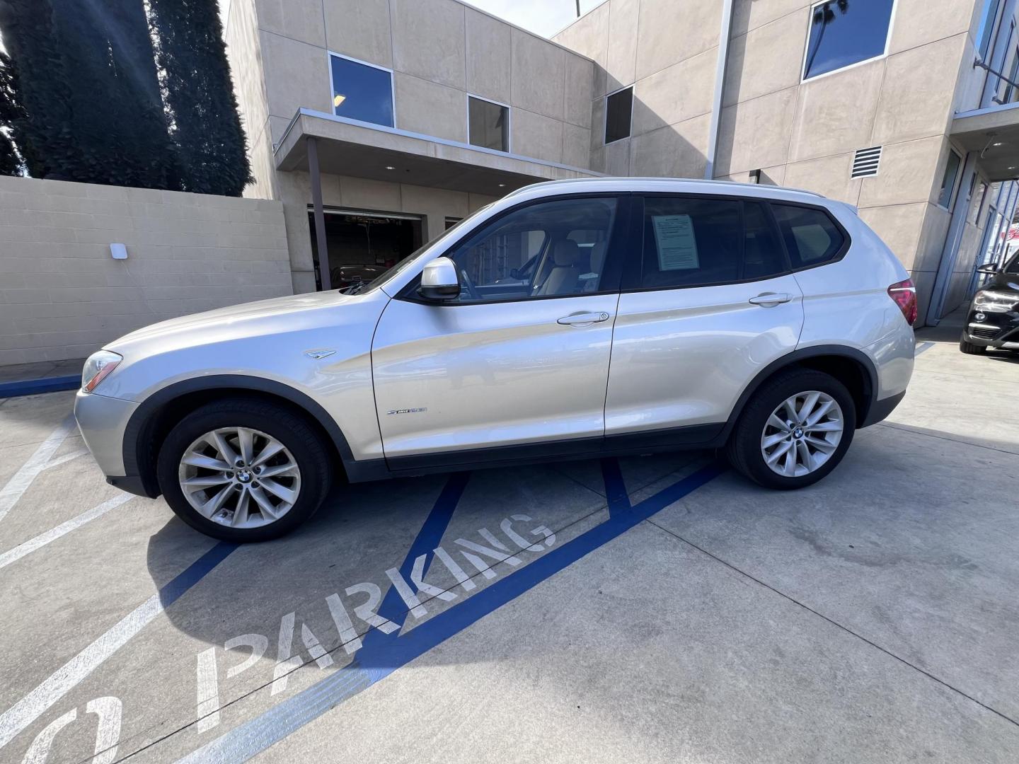 2017 Silver Metallic /Tan BMW X3 sDrive28i (5UXWZ7C51H0) with an 2.0L L4 DOHC 16V engine, 8A transmission, located at 30 S. Berkeley Avenue, Pasadena, CA, 91107, (626) 248-7567, 34.145447, -118.109398 - Are you in the market for a luxurious, reliable, and feature-packed SUV in Pasadena, CA? Look no further than this stunning 2017 BMW X3, available now at Crown City Motors, located at 30 S Berkeley Ave, Pasadena, CA 91107. As a trusted buy here pay here dealer, we specialize in offering top-quality - Photo#2