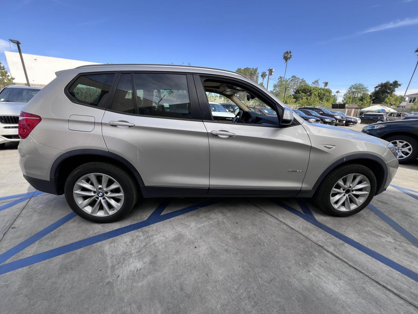 2017 Silver Metallic /Tan BMW X3 sDrive28i (5UXWZ7C51H0) with an 2.0L L4 DOHC 16V engine, 8A transmission, located at 30 S. Berkeley Avenue, Pasadena, CA, 91107, (626) 248-7567, 34.145447, -118.109398 - Are you in the market for a luxurious, reliable, and feature-packed SUV in Pasadena, CA? Look no further than this stunning 2017 BMW X3, available now at Crown City Motors, located at 30 S Berkeley Ave, Pasadena, CA 91107. As a trusted buy here pay here dealer, we specialize in offering top-quality - Photo#7
