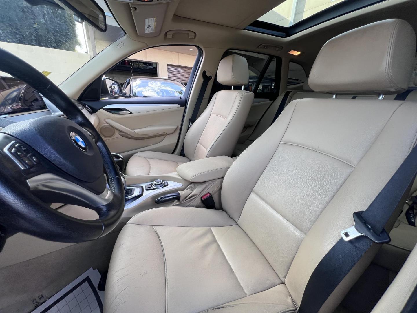 2013 White BMW X1 sDrive28i (WBAVM1C51DV) with an 2.0L L4 DOHC 16V engine, 8-Speed Automatic transmission, located at 30 S. Berkeley Avenue, Pasadena, CA, 91107, (626) 248-7567, 34.145447, -118.109398 - Crown City Motors is a used “Buy Here Pay Here” car dealer in Pasadena CA. “Buy Here Pay Here” financing, means that when you purchase your vehicle from our dealership, that you make the payments to the dealership as well. We do not need the banks approval to get you approved for a used auto - Photo#10