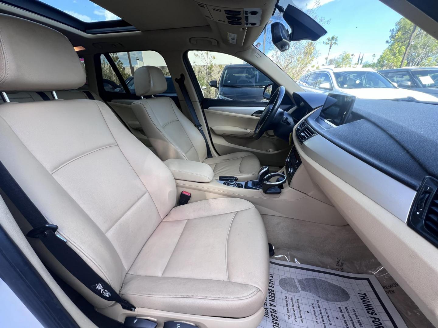 2013 White BMW X1 sDrive28i (WBAVM1C51DV) with an 2.0L L4 DOHC 16V engine, 8-Speed Automatic transmission, located at 30 S. Berkeley Avenue, Pasadena, CA, 91107, (626) 248-7567, 34.145447, -118.109398 - Crown City Motors is a used “Buy Here Pay Here” car dealer in Pasadena CA. “Buy Here Pay Here” financing, means that when you purchase your vehicle from our dealership, that you make the payments to the dealership as well. We do not need the banks approval to get you approved for a used auto - Photo#15