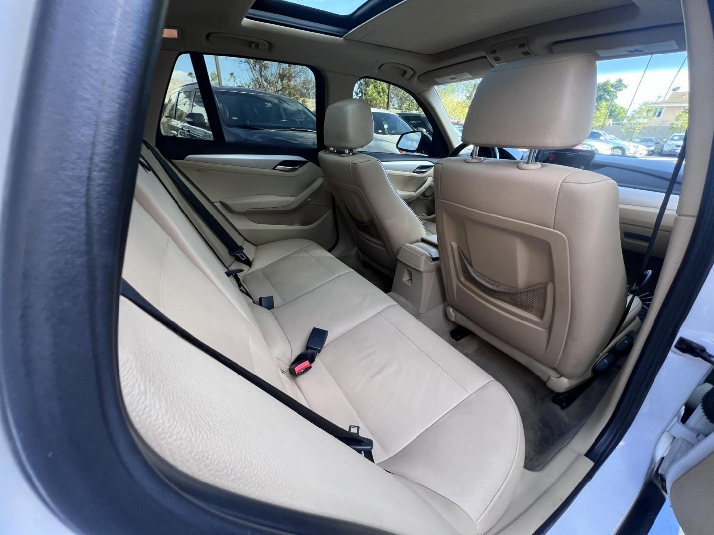 2013 White BMW X1 sDrive28i (WBAVM1C51DV) with an 2.0L L4 DOHC 16V engine, 8-Speed Automatic transmission, located at 30 S. Berkeley Avenue, Pasadena, CA, 91107, (626) 248-7567, 34.145447, -118.109398 - Crown City Motors is a used “Buy Here Pay Here” car dealer in Pasadena CA. “Buy Here Pay Here” financing, means that when you purchase your vehicle from our dealership, that you make the payments to the dealership as well. We do not need the banks approval to get you approved for a used auto - Photo#18