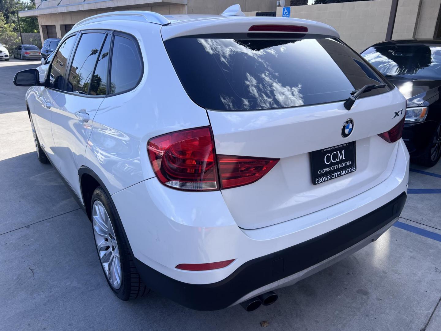 2013 White BMW X1 sDrive28i (WBAVM1C51DV) with an 2.0L L4 DOHC 16V engine, 8-Speed Automatic transmission, located at 30 S. Berkeley Avenue, Pasadena, CA, 91107, (626) 248-7567, 34.145447, -118.109398 - Crown City Motors is a used “Buy Here Pay Here” car dealer in Pasadena CA. “Buy Here Pay Here” financing, means that when you purchase your vehicle from our dealership, that you make the payments to the dealership as well. We do not need the banks approval to get you approved for a used auto - Photo#2