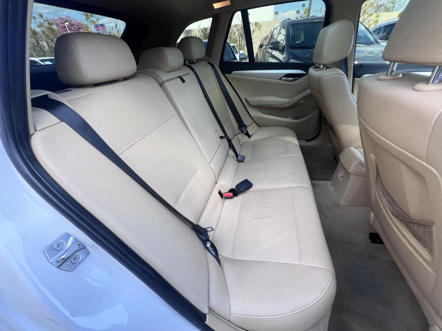 2013 White BMW X1 sDrive28i (WBAVM1C51DV) with an 2.0L L4 DOHC 16V engine, 8-Speed Automatic transmission, located at 30 S. Berkeley Avenue, Pasadena, CA, 91107, (626) 248-7567, 34.145447, -118.109398 - Crown City Motors is a used “Buy Here Pay Here” car dealer in Pasadena CA. “Buy Here Pay Here” financing, means that when you purchase your vehicle from our dealership, that you make the payments to the dealership as well. We do not need the banks approval to get you approved for a used auto - Photo#20