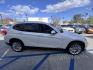 2013 White BMW X1 sDrive28i (WBAVM1C51DV) with an 2.0L L4 DOHC 16V engine, 8-Speed Automatic transmission, located at 30 S. Berkeley Avenue, Pasadena, CA, 91107, (626) 248-7567, 34.145447, -118.109398 - Crown City Motors is a used “Buy Here Pay Here” car dealer in Pasadena CA. “Buy Here Pay Here” financing, means that when you purchase your vehicle from our dealership, that you make the payments to the dealership as well. We do not need the banks approval to get you approved for a used auto - Photo#5
