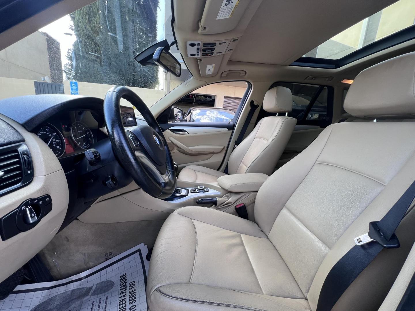 2013 White BMW X1 sDrive28i (WBAVM1C51DV) with an 2.0L L4 DOHC 16V engine, 8-Speed Automatic transmission, located at 30 S. Berkeley Avenue, Pasadena, CA, 91107, (626) 248-7567, 34.145447, -118.109398 - Crown City Motors is a used “Buy Here Pay Here” car dealer in Pasadena CA. “Buy Here Pay Here” financing, means that when you purchase your vehicle from our dealership, that you make the payments to the dealership as well. We do not need the banks approval to get you approved for a used auto - Photo#6