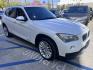 2013 White BMW X1 sDrive28i (WBAVM1C51DV) with an 2.0L L4 DOHC 16V engine, 8-Speed Automatic transmission, located at 30 S. Berkeley Avenue, Pasadena, CA, 91107, (626) 248-7567, 34.145447, -118.109398 - Crown City Motors is a used “Buy Here Pay Here” car dealer in Pasadena CA. “Buy Here Pay Here” financing, means that when you purchase your vehicle from our dealership, that you make the payments to the dealership as well. We do not need the banks approval to get you approved for a used auto - Photo#7
